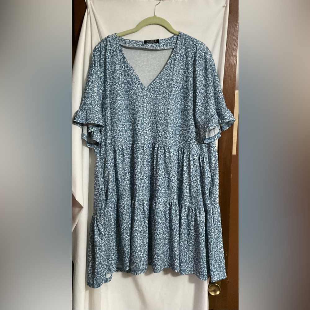 NCLOOK: vneck/flowy /babydoll light blue floral dress with 2 slide side pockets.
